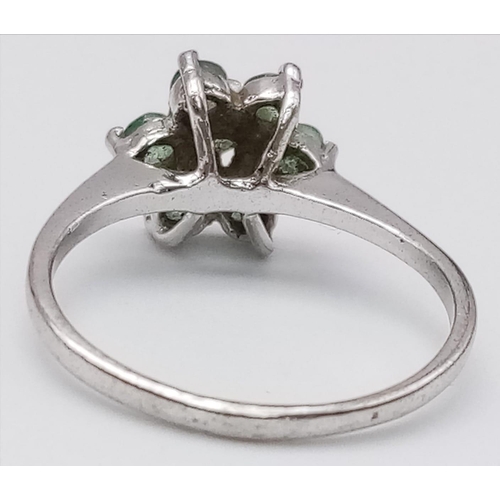 1244 - A 925 Silver and Emerald Ring. Size M.