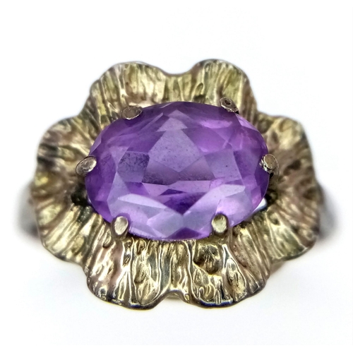 1269 - A vintage sterling silver faceted Amethyst solitaire ring. Total weight 2.1G. Size O.