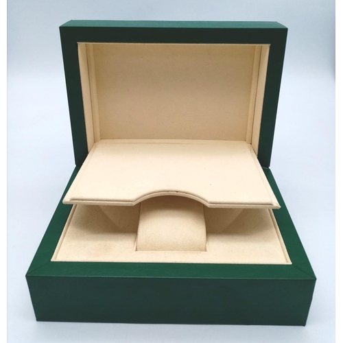 1318 - A Rolex Watch Case. Green ruffled exterior. Single watch space interior.  18cm x 13cm