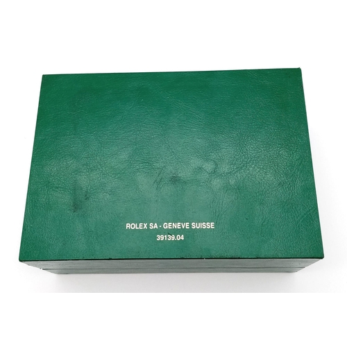 1318 - A Rolex Watch Case. Green ruffled exterior. Single watch space interior.  18cm x 13cm