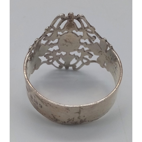 1340 - An antique sterling silver filigree napkin ring with full Birmingham hallmarks, 1903. Total weight 2... 