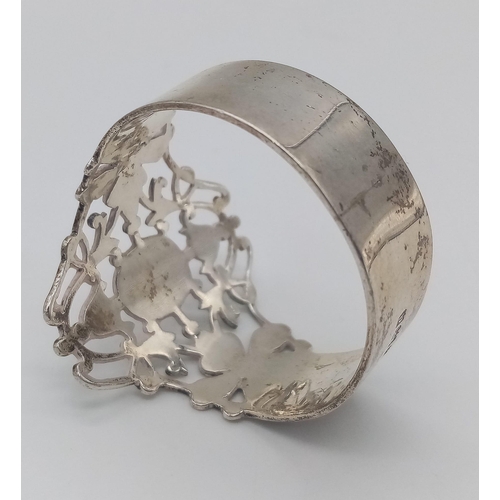 1340 - An antique sterling silver filigree napkin ring with full Birmingham hallmarks, 1903. Total weight 2... 