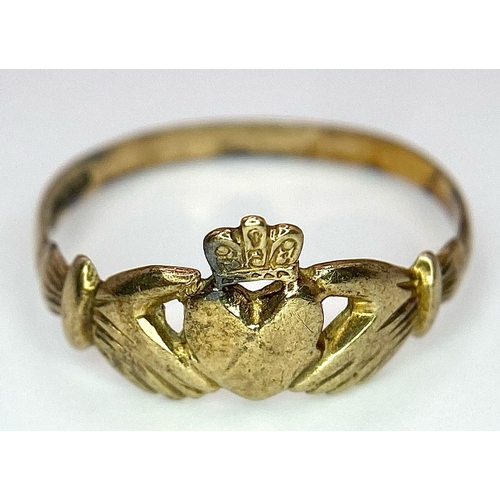 1375 - A 9K YELLOW GOLD CLADDAGH RING. 1.1G. SIZE N