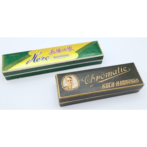 450 - A Vintage German Koch Harmonica and a Chinese Hero Harmonica. Both in original boxes.