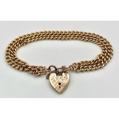 50 - A Beautiful Vintage 9K Gold  Two Row Curb Link Bracelet with Heart Clasp. 18cm length. 26.75g weight... 