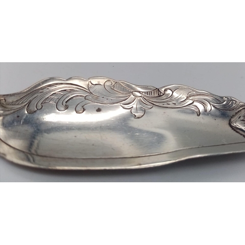 751 - An antique sterling silver fish knife with flower motif. Full hallmarks Sheffield, 1856. Total weigh... 