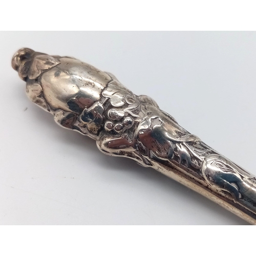 751 - An antique sterling silver fish knife with flower motif. Full hallmarks Sheffield, 1856. Total weigh... 