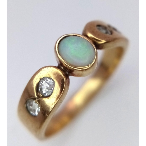 955 - A Vintage 9k Opal and Diamond Ring. Size I/J. 1.9g total weight.