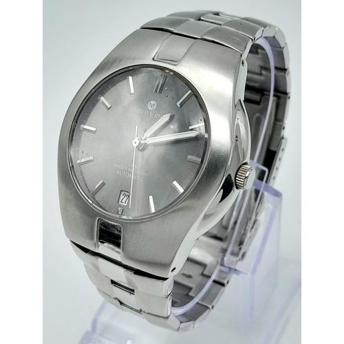 1501 - A Marco Ceroni Watch. Stainless steel bracelet and case - 40mm. In working order. Comes with a case.