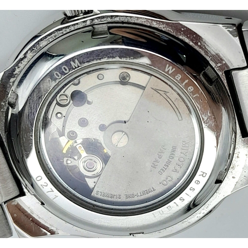 1501 - A Marco Ceroni Watch. Stainless steel bracelet and case - 40mm. In working order. Comes with a case.