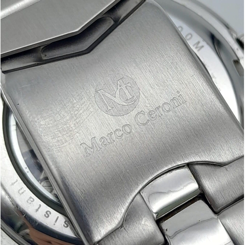 1501 - A Marco Ceroni Watch. Stainless steel bracelet and case - 40mm. In working order. Comes with a case.