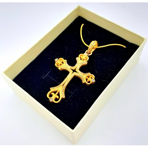 168 - A vintage (or possibly older) fancy silver and yellow gold cross with numerous old cut diamonds. In ... 