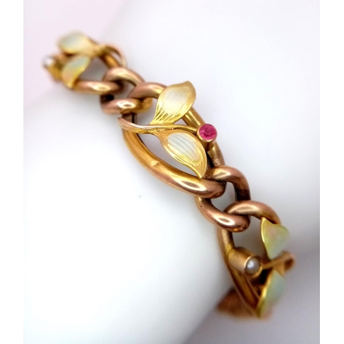 214 - AN ANTIQUE 9K GOLD BRACELET WITH ORNATE LEAF EFFECT , SEED PEARLS AND PINK RUBY .  11.2gns  17cms