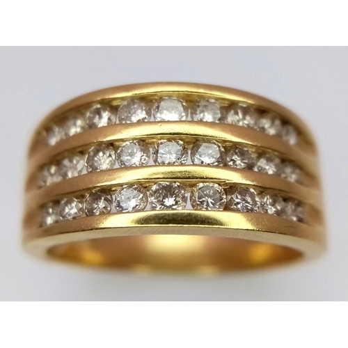 260 - An 18K YELLOW GOLD 3 ROW DIAMOND RING - 1CT. 7.5G. SIZE Q