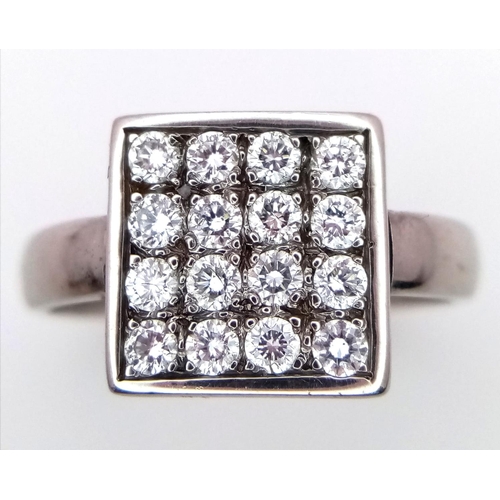 267 - An 18K WHITE GOLD DIAMOND SQUARE CLUSTER RING.  0.50CT. 5.3G. SIZE L.