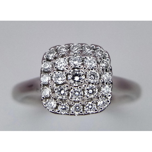 274 - AN 18K WHITE GOLD DIAMOND RING. 0.40CT. 4G SIZE L