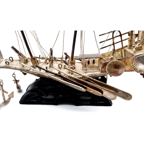 335 - Early Chinese Silver (tested) Warship Model. Excellent detail with rigging, cannons and oars. Mounte... 