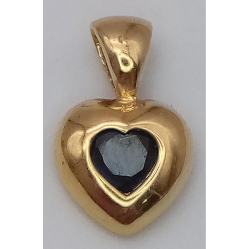 1250 - AN 18K YELLOW GOLD SAPPHIRE SET HEART PENDANT. 0.7G