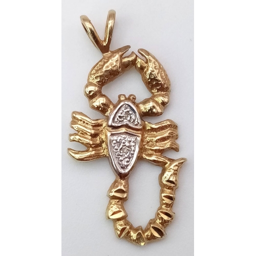 1344 - A 9K YELLOW GOLD DIAMOND SET SCORPION CHARM / PENDANT. 2.2G