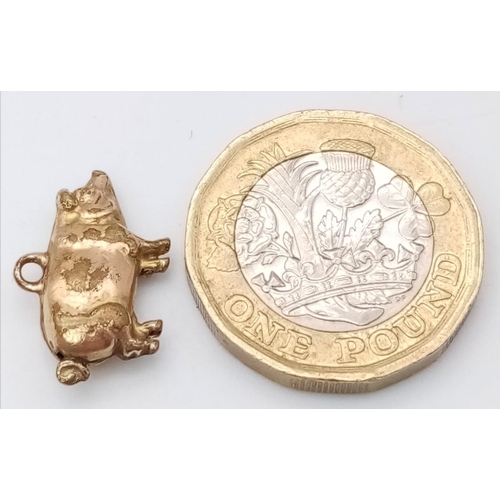 1488 - A 9K YELLOW GOLD PIG CHARM. 0.8G