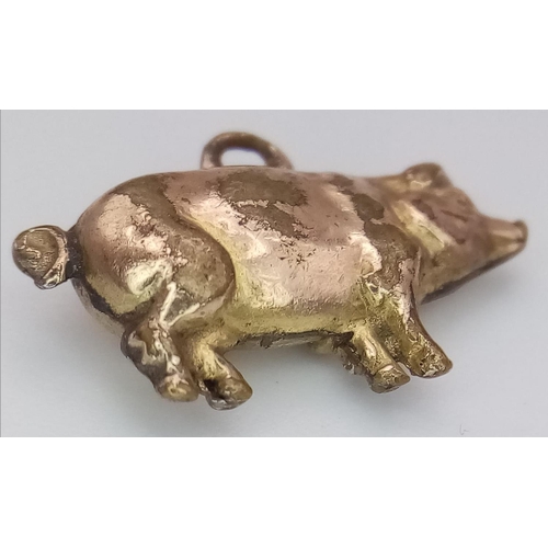 1488 - A 9K YELLOW GOLD PIG CHARM. 0.8G