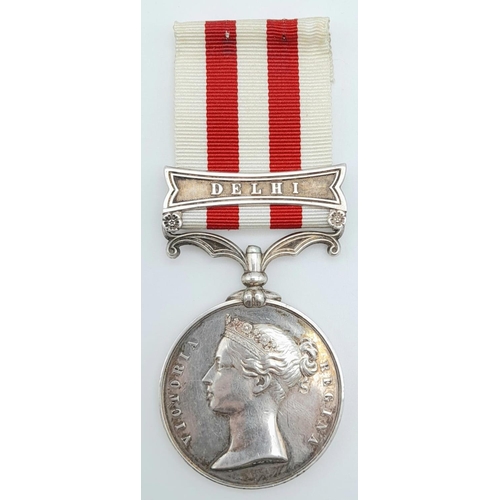 8 - An Indian Mutiny Medal 1857-1858, with clasp ‘DELHI’; named to John Brown 1st Bn 8th Regt (renamed t... 