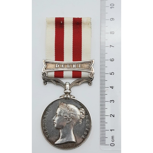 8 - An Indian Mutiny Medal 1857-1858, with clasp ‘DELHI’; named to John Brown 1st Bn 8th Regt (renamed t... 