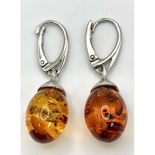 892 - A Pair of Excellent Condition, Silver Amber, Secure Fit Earrings. 3.5cm length.