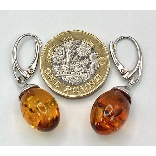 892 - A Pair of Excellent Condition, Silver Amber, Secure Fit Earrings. 3.5cm length.