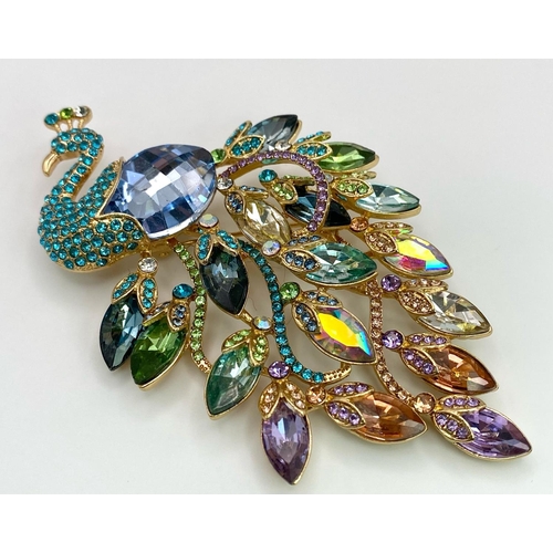 992 - A Stunning Multi-Colour Stone Set Peacock Brooch and/or Pendant. This piece can be worn as a Bar Bro... 