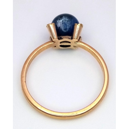 1183 - AN ANTIQUE 22K ROSE GOLD RING WITH SAPPHIRE BALL SURROUNDED BY DIAMONDS .   4.9gms   size T