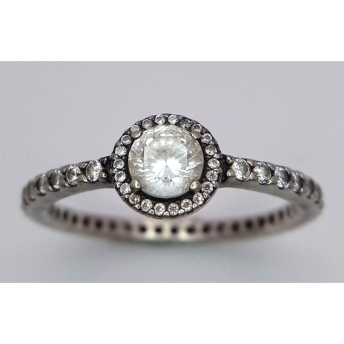 1339 - A fancy 925 silver Pandora Zirconia solitaire ring with full eternity round CZ. Total weight 2.35G. ... 