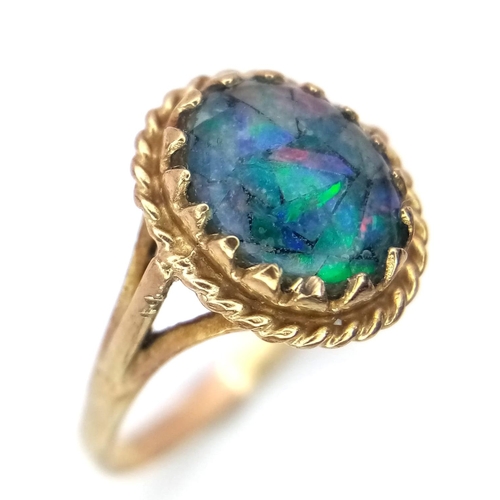 1418 - A 9K YELLOW GOLD OPAL SET RING. 1.4G. SIZE I 1/2