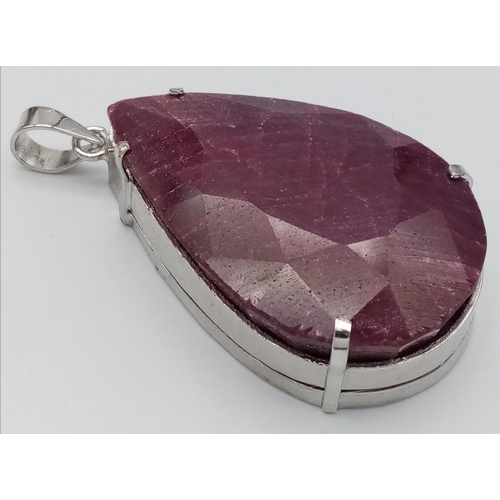 496 - A Large 90ct Teardrop Ruby Pendant. 86g total weight. 7cm. Ref: VO-1798. Comes with a presentation c... 