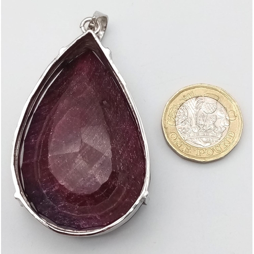 496 - A Large 90ct Teardrop Ruby Pendant. 86g total weight. 7cm. Ref: VO-1798. Comes with a presentation c... 