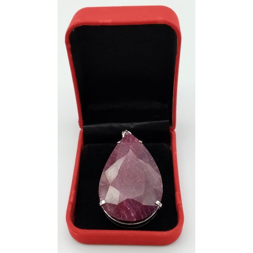 496 - A Large 90ct Teardrop Ruby Pendant. 86g total weight. 7cm. Ref: VO-1798. Comes with a presentation c... 