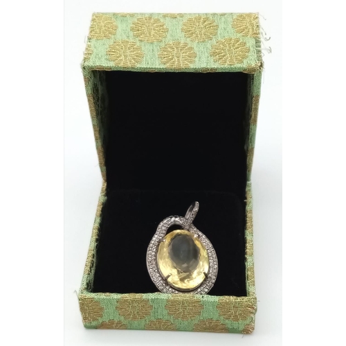 508 - A Citrine Silver Pendant with Rose Cut Diamonds set in 925 Sterling Silver. Citrine- 26.55ctw. Diamo... 