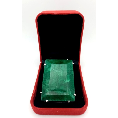 96 - A Large Rectangular Emerald Pendant set in 925 Sterling silver. 100ct. W-95.60g. 7cm. Comes with a p... 