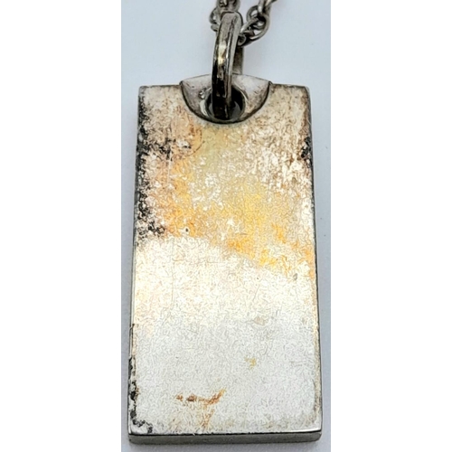 1023 - A vintage sterling silver ingot pendant on silver chain. Full hallmarks Birmingham, 1979. Total weig... 