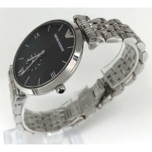 1239 - An Emporio Armani Gents Watch. Stainless steel bracelet and case - 40mm. Black dial with second dial... 