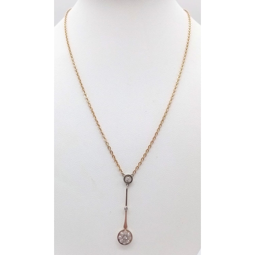 1312 - A VINTAGE 9K GOLD LAVALIER DIAMOND PENDANT ON A 40cms  9K GOLD CHAIN .  4.7gms