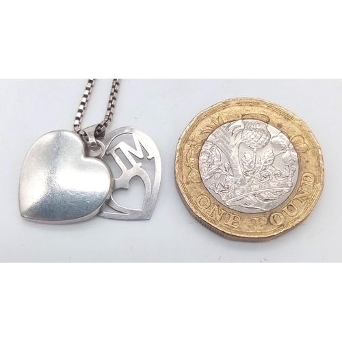 1326 - A fancy 925 silver ''MUM'' and CZ cluster heart pendants on silver snake chain. Total weight 4.25G. ... 