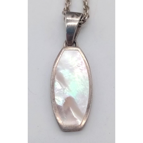 1346 - A vintage 925 silver Mother of Pearl pendant on silver chain. Total weight 6.55G. Total length 54cm.