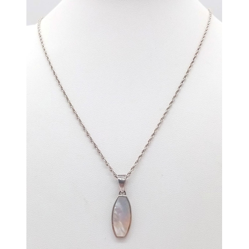 1346 - A vintage 925 silver Mother of Pearl pendant on silver chain. Total weight 6.55G. Total length 54cm.