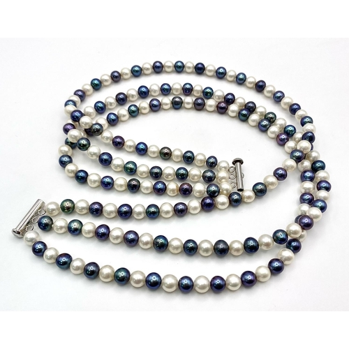 244 - A Multi-Coloured Three Row Cultured Pearl Necklace on a 925 Silver Clasp. 40-44cm.