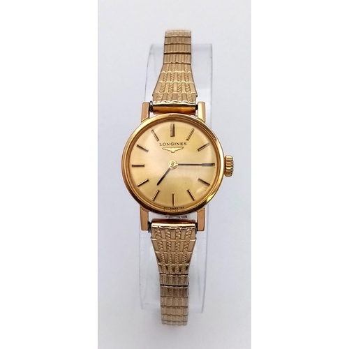 338 - A Vintage Longines Ladies Watch. Expandable gold plated bracelet, case - 21mm. Mechanical movement. ... 