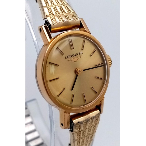 338 - A Vintage Longines Ladies Watch. Expandable gold plated bracelet, case - 21mm. Mechanical movement. ... 