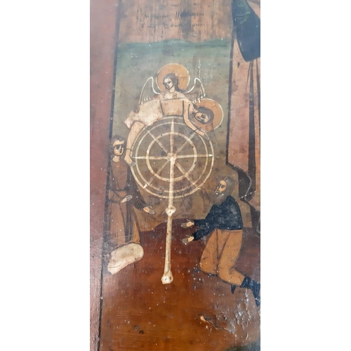 1007 - An Antique Icon of Saint Catherine of Alexandria and the Spiked Wheel - Oil on wood. Saint Catherine... 