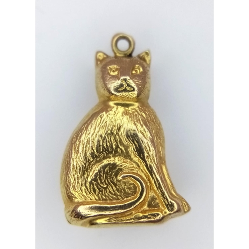 1320 - A 9K YELLOW GOLD PUSSY CAT CHARM. 0.9G.