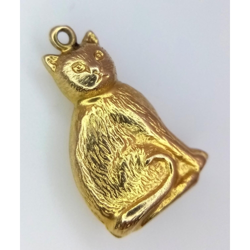 1320 - A 9K YELLOW GOLD PUSSY CAT CHARM. 0.9G.